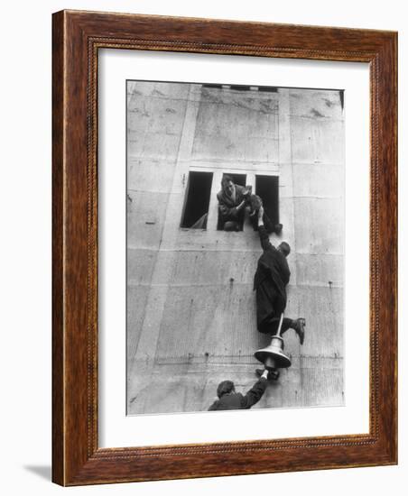 Scottish Fans Scaling Wall to Avoid High Ticket Prices For Soccer Game Between Scotland and England-Cornell Capa-Framed Photographic Print