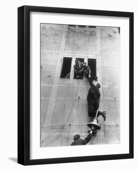 Scottish Fans Scaling Wall to Avoid High Ticket Prices For Soccer Game Between Scotland and England-Cornell Capa-Framed Photographic Print