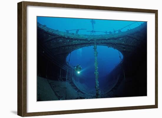 Scuba Diver Exploring a Shipwreck, Papua New Guinea, Coral Sea.-Reinhard Dirscherl-Framed Photographic Print