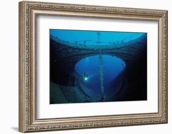 Scuba Diver Exploring a Shipwreck, Papua New Guinea, Coral Sea.-Reinhard Dirscherl-Framed Photographic Print