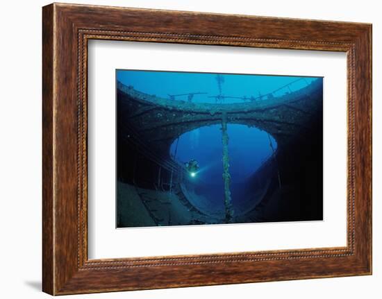 Scuba Diver Exploring a Shipwreck, Papua New Guinea, Coral Sea.-Reinhard Dirscherl-Framed Photographic Print