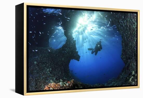 Scuba Diver Swimming through an Arch-Bernard Radvaner-Framed Premier Image Canvas