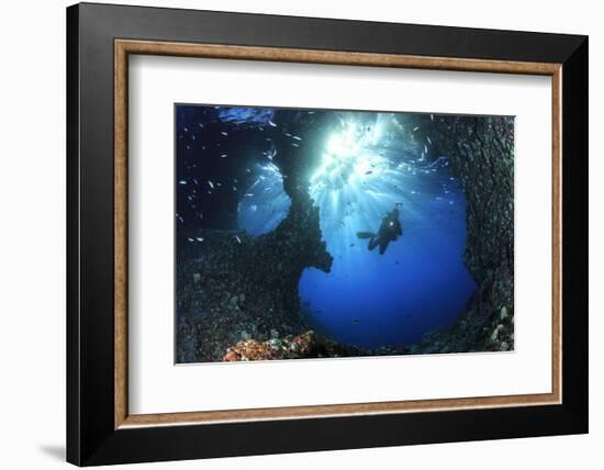 Scuba Diver Swimming through an Arch-Bernard Radvaner-Framed Photographic Print