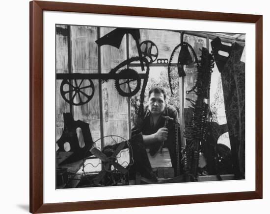 Sculptor Edwardo Paolozzi Posing in His Studio-null-Framed Premium Photographic Print