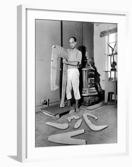 Sculptor Isamu Noguchi at Work on a Piece in His Studio-Eliot Elisofon-Framed Premium Photographic Print