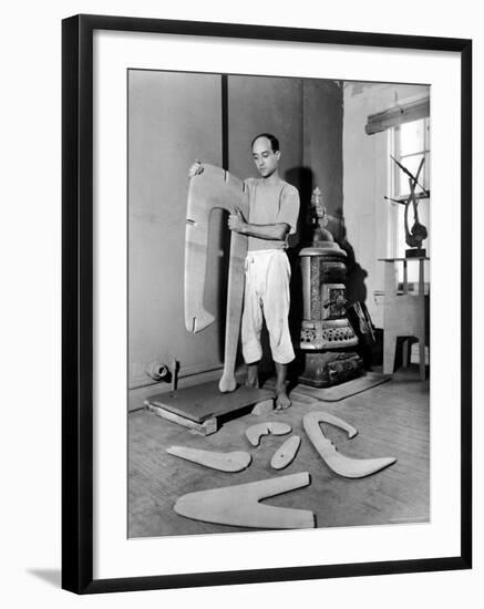 Sculptor Isamu Noguchi at Work on a Piece in His Studio-Eliot Elisofon-Framed Premium Photographic Print