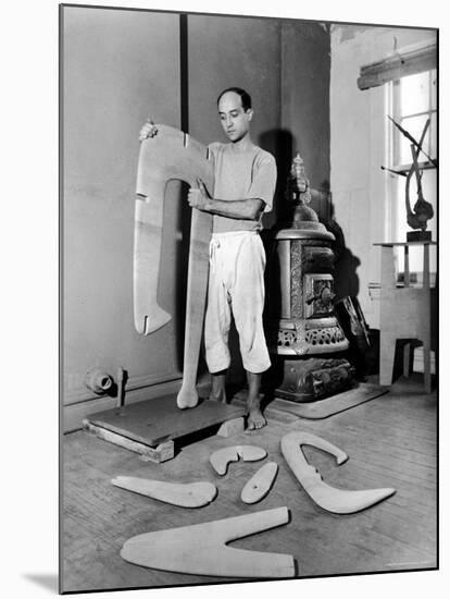 Sculptor Isamu Noguchi at Work on a Piece in His Studio-Eliot Elisofon-Mounted Premium Photographic Print