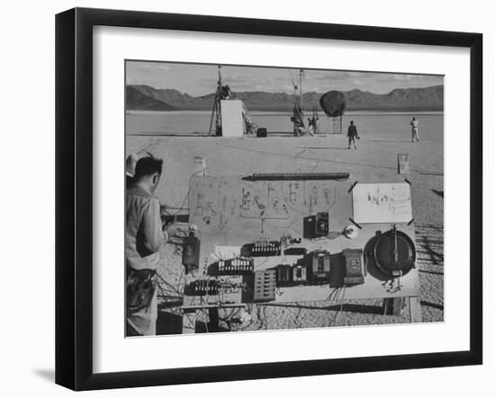 Sculpture Jean Tinguely in Nevada Desert Trying Out His Self-Destruction Machine Sculpture-Allan Grant-Framed Photographic Print