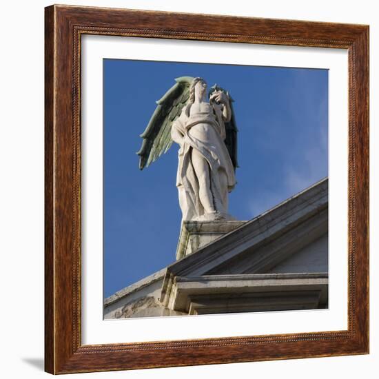 Scuola Grande Di San Fantin, Venice - Statue of Angel with Wings Above Pediment (Detail)-Mike Burton-Framed Photographic Print