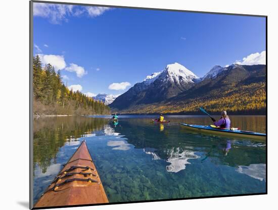 Sea Kayaking on Bowman Lake in Autumn in Glacier National Park, Montana, Usa-Chuck Haney-Mounted Photographic Print