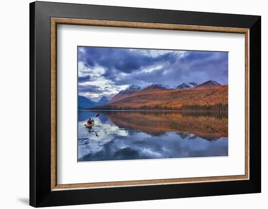 Sea kayaking on Bowman Lake in autumn in Glacier National Park, Montana, USA-Chuck Haney-Framed Photographic Print