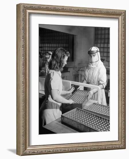 Sealed Vials of Penicillin Being Passed from the Sterile Production Room to Packaging Room-Fritz Goro-Framed Photographic Print