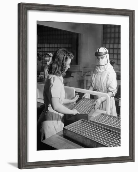 Sealed Vials of Penicillin Being Passed from the Sterile Production Room to Packaging Room-Fritz Goro-Framed Photographic Print