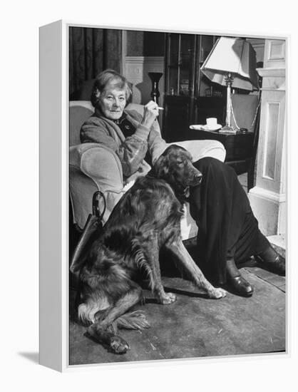 Sean Macbride's Mother, Maud Gonne Macbride, Sitting at Home with Her Dog-Tony Linck-Framed Premier Image Canvas