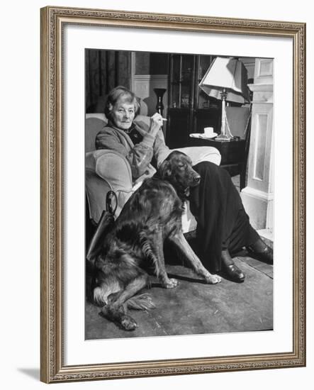 Sean Macbride's Mother, Maud Gonne Macbride, Sitting at Home with Her Dog-Tony Linck-Framed Premium Photographic Print