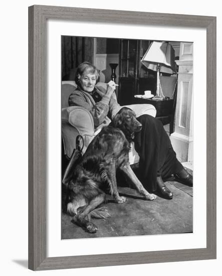 Sean Macbride's Mother, Maud Gonne Macbride, Sitting at Home with Her Dog-Tony Linck-Framed Premium Photographic Print