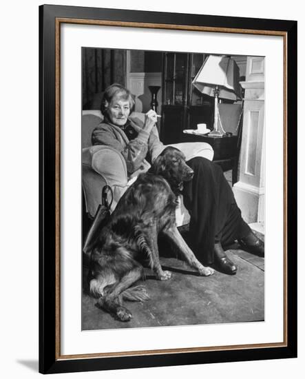 Sean Macbride's Mother, Maud Gonne Macbride, Sitting at Home with Her Dog-Tony Linck-Framed Premium Photographic Print