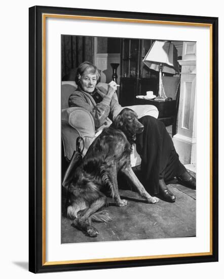 Sean Macbride's Mother, Maud Gonne Macbride, Sitting at Home with Her Dog-Tony Linck-Framed Premium Photographic Print