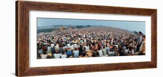 Seated Crowd Listening to Musicians Perform at Woodstock Music Festival-John Dominis-Framed Photographic Print