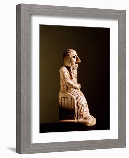 Seated votive figure, Both the dress and the chair are portrayed in vivid detail-Werner Forman-Framed Giclee Print