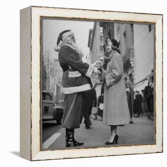 Secretary Eileen Godsil Talking with a Department Store Santa Claus on 5th Avenue-Martha Holmes-Framed Premier Image Canvas