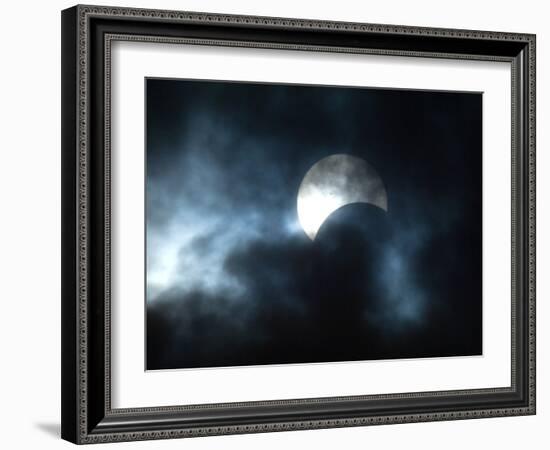 Seen Through Clouds the Sun is Partially Obscured by the Moon During an Eclipse-null-Framed Photographic Print