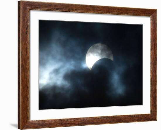 Seen Through Clouds the Sun is Partially Obscured by the Moon During an Eclipse-null-Framed Photographic Print