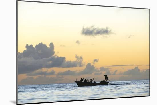 Seine fisherman lay their nets from a boat in Castara Bay in Tobago at sunset, Trinidad and Tobago-Alex Treadway-Mounted Photographic Print