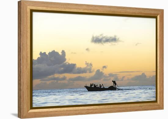 Seine fisherman lay their nets from a boat in Castara Bay in Tobago at sunset, Trinidad and Tobago-Alex Treadway-Framed Premier Image Canvas