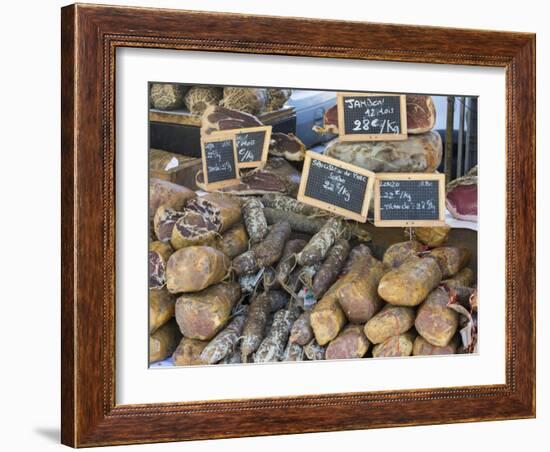 Selection of Corsican sausages and hams for sale at open-air market in Place Foch, Ajaccio-David Tomlinson-Framed Photographic Print