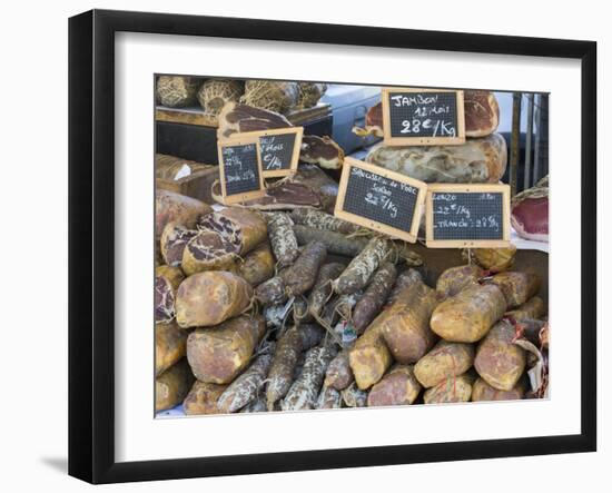 Selection of Corsican sausages and hams for sale at open-air market in Place Foch, Ajaccio-David Tomlinson-Framed Photographic Print