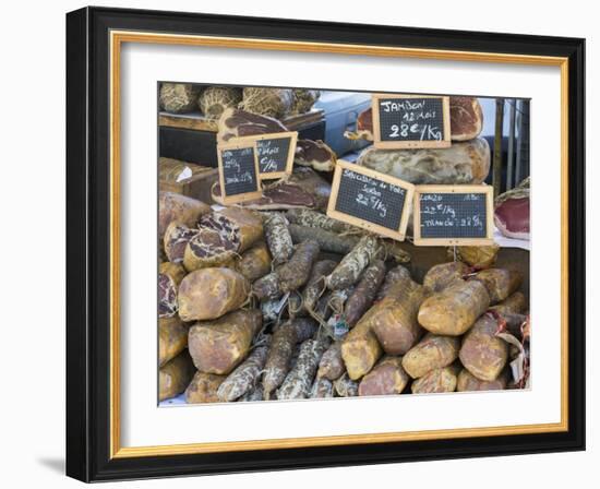 Selection of Corsican sausages and hams for sale at open-air market in Place Foch, Ajaccio-David Tomlinson-Framed Photographic Print