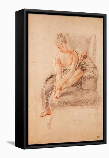 Semi-Nude Woman Seated on a Chaise Longue, Holding Her Foot (Sanguine and Black Chalk on Paper)-Jean Antoine Watteau-Framed Premier Image Canvas
