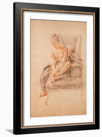 Semi-Nude Woman Seated on a Chaise Longue, Holding Her Foot (Sanguine and Black Chalk on Paper)-Jean Antoine Watteau-Framed Giclee Print