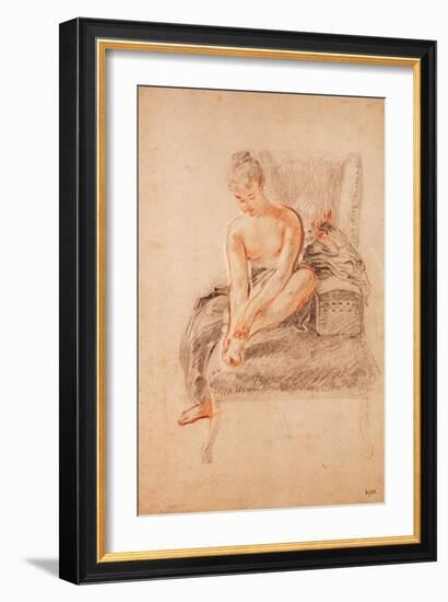 Semi-Nude Woman Seated on a Chaise Longue, Holding Her Foot (Sanguine and Black Chalk on Paper)-Jean Antoine Watteau-Framed Giclee Print