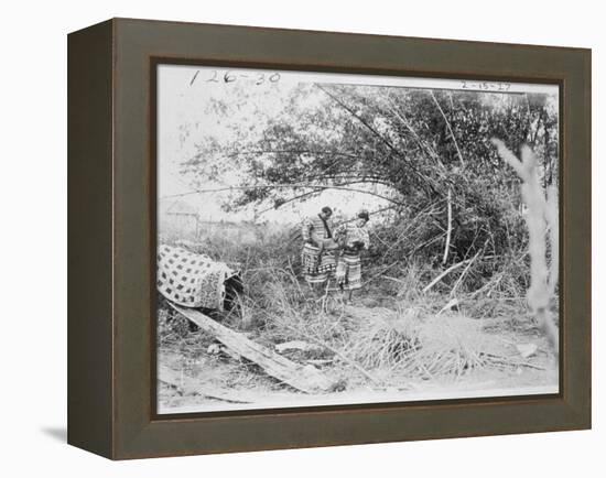 Seminole Indians with a Captured Alligator-American Photographer-Framed Premier Image Canvas