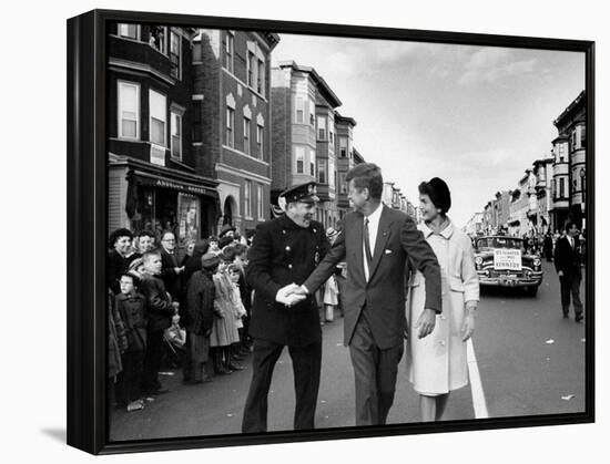 Sen. Jack Kennedy with Jackie, Walking Down Middle of the Street During Senate Re-Election Campaign-Carl Mydans-Framed Premier Image Canvas