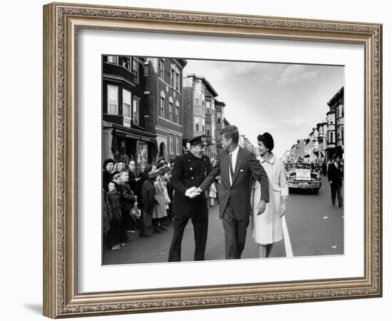 Sen. Jack Kennedy with Jackie, Walking Down Middle of the Street During Senate Re-Election Campaign-Carl Mydans-Framed Photographic Print