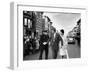 Sen. Jack Kennedy with Jackie, Walking Down Middle of the Street During Senate Re-Election Campaign-Carl Mydans-Framed Photographic Print