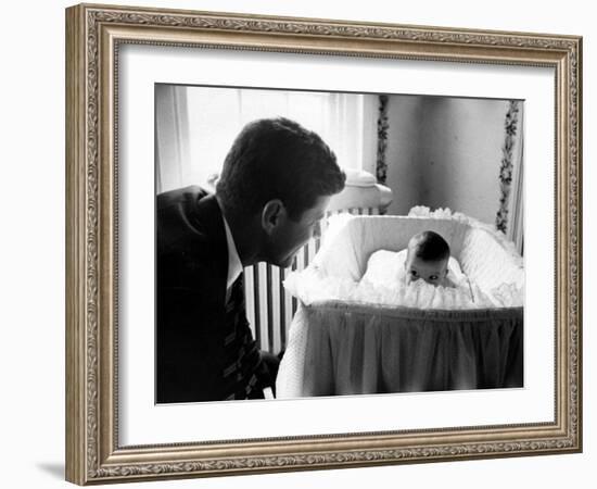 Sen. John F. Kennedy Playing Peek-A-Boo with His Daughter Caroline in Her Crib-Ed Clark-Framed Photographic Print