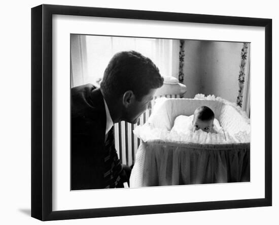 Sen. John F. Kennedy Playing Peek-A-Boo with His Daughter Caroline in Her Crib-Ed Clark-Framed Photographic Print