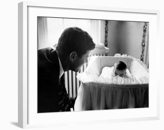 Sen. John F. Kennedy Playing Peek-A-Boo with His Daughter Caroline in Her Crib-Ed Clark-Framed Photographic Print