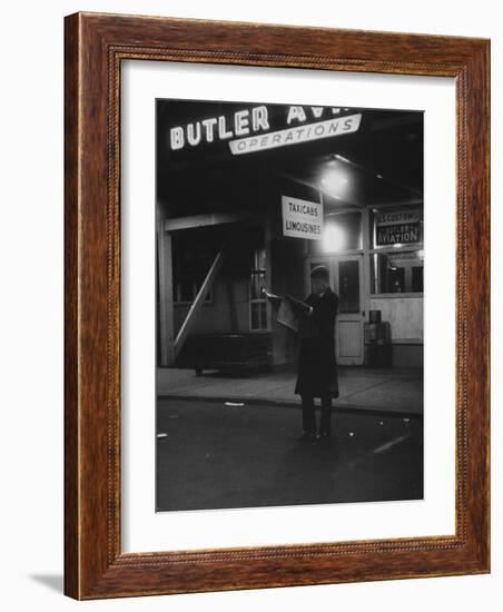 Sen. John F. Kennedy Reading the Newspaper-Ed Clark-Framed Photographic Print