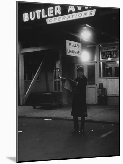 Sen. John F. Kennedy Reading the Newspaper-Ed Clark-Mounted Photographic Print