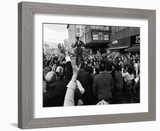 Sen. Robert Kennedy Standing on Roof of Car as He is Swamped by a Crowd of Welcoming Well Wishers-Bill Eppridge-Framed Photographic Print