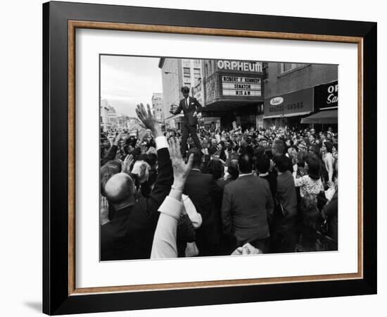 Sen. Robert Kennedy Standing on Roof of Car as He is Swamped by a Crowd of Welcoming Well Wishers-Bill Eppridge-Framed Photographic Print