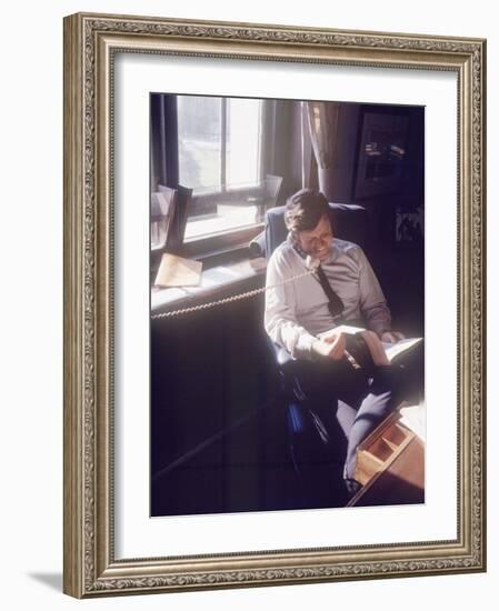 Senator Edward M. Kennedy on the Phone in His Office, Probably in Washington Dc-John Loengard-Framed Premium Photographic Print