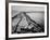 Senator Edward M. Kennedy Taking a Sunbath on Breakwater Near His Summer Home-John Loengard-Framed Photographic Print