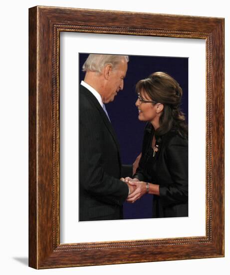 Senator Joe Biden and Governor Sarah Palin Shake Hands before the Start of Vice Presidential Debate-null-Framed Photographic Print