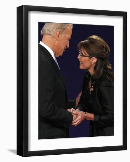 Senator Joe Biden and Governor Sarah Palin Shake Hands before the Start of Vice Presidential Debate-null-Framed Photographic Print